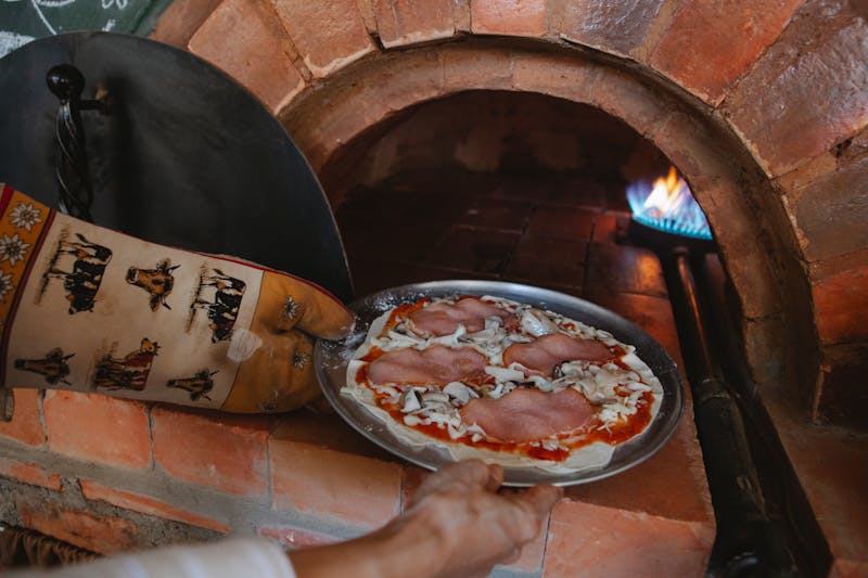 Pequod's sausage and mushroom deep dish pizza